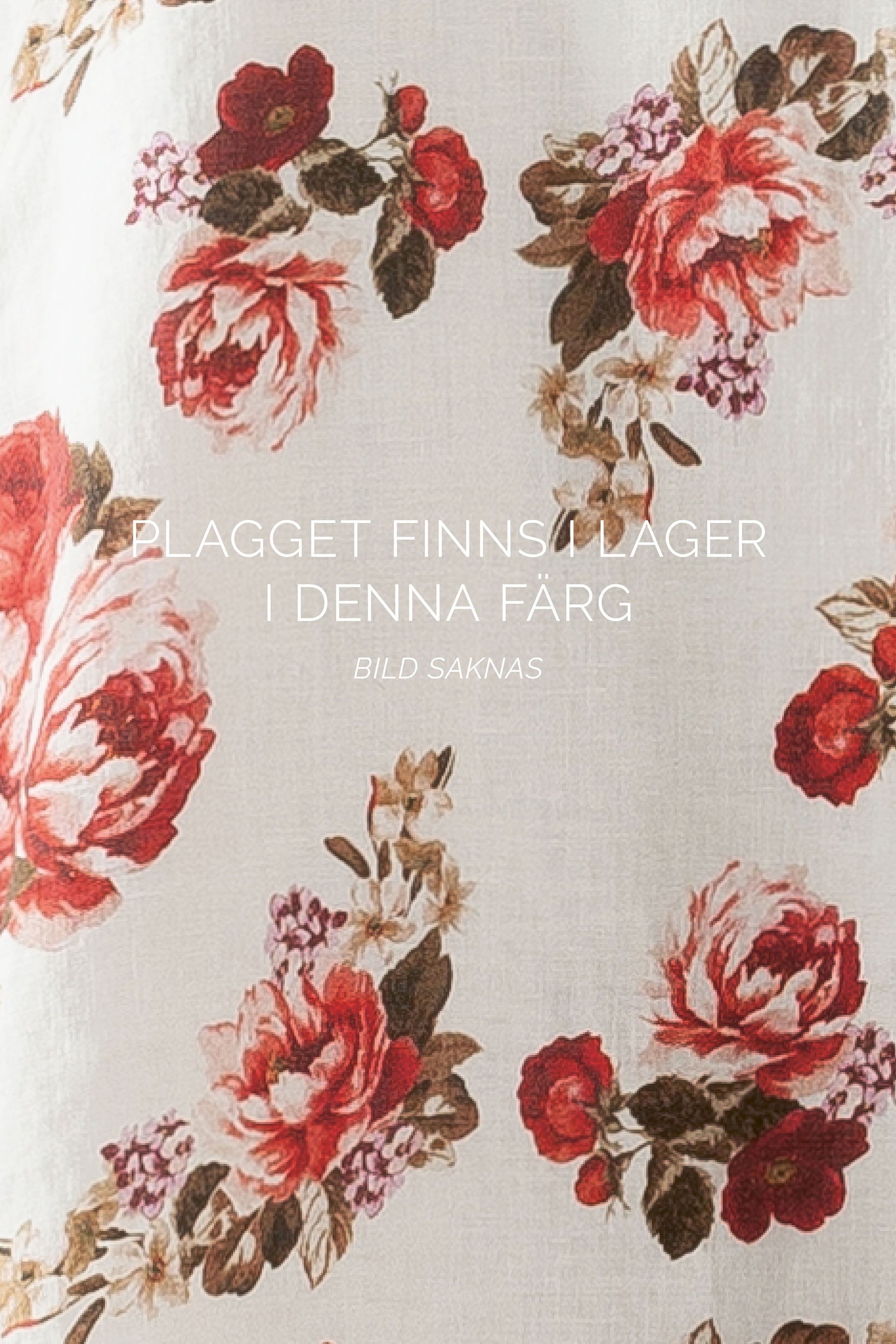 Linnebukse med folder og stropper på benet